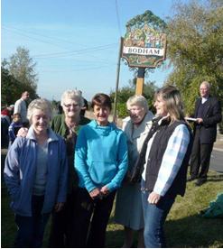 Bodham Ladies presenting the new village sign, Bodham, North Norfolk, UK