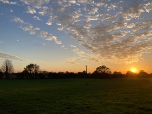 Sunset over fields in Bodham, North Norfolk, UK